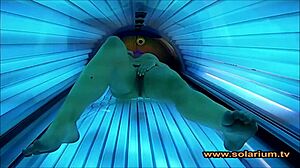 beautiful woman teases solarium cam with secret masturbation show