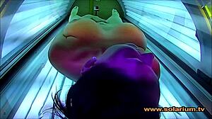 beautiful woman teases solarium cam with secret masturbation show