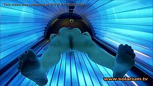 beautiful woman teases solarium cam with secret masturbation show