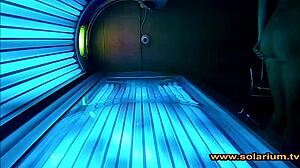 beautiful woman teases solarium cam with secret masturbation show