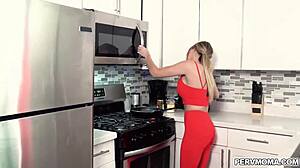 linzee ryder slurps stepson's cock then titfucks in kitchen