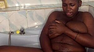 big titted ebony squirts crazy with huge bathroom dildo