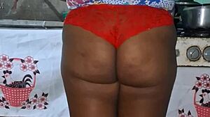 check out this curvy ebony bbw flashing her huge tits and cameltoe in the kitchen