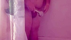 small cock gets steamy rinse under cascading shower water