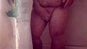 small cock gets steamy rinse under cascading shower water