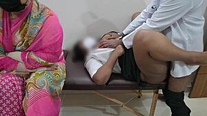 Doctor examines patient right in front of watchful mom at hospital