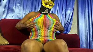 Hey, you see this curvy masked queen oiling her huge puffy tits while stroking slow? Don't you wanna watch her explode?