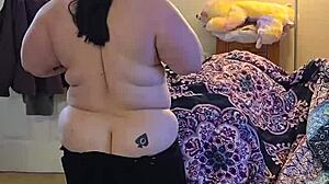 bbw milf strips black dress dances teases huge natural tits naked