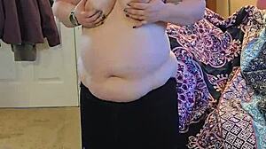 bbw milf strips black dress dances teases huge natural tits naked