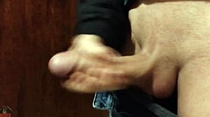 Skinny young babe jerks massive cock in bathroom homemade style