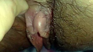 clit pulsing with soft teasing strokes