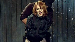 Redhead In Strait Jacket Gets Tormented Hard