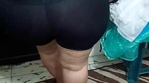 Watch this mature lady shake her big ass in shiny spandex.