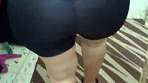 Watch this mature lady shake her big ass in shiny spandex.