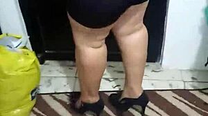 Watch this mature lady shake her big ass in shiny spandex.