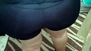 Watch this mature lady shake her big ass in shiny spandex.