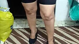 Watch this mature lady shake her big ass in shiny spandex.