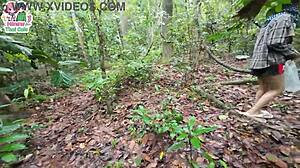 Thai teen walks in forest and shows pussy