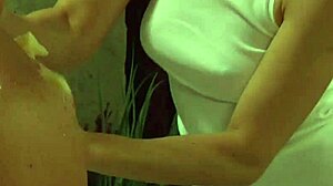 Hot nude lesbian madame enjoys wash and massage by slave