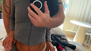 POV Footage Captures Tattooed Latina Bent Over Before Mirror