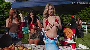 partying blonde sucks cock in the bush