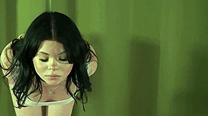 lola valentine strips naked spreads legs and fingers pussy
