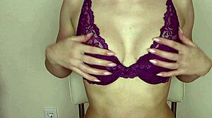 Sultry brunette tries on new lingerie seductively