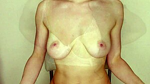Sultry brunette tries on new lingerie seductively