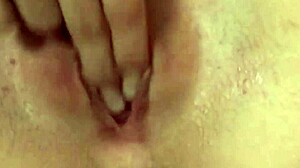 Redhead riley strips nude then fingers her dripping wet pussy