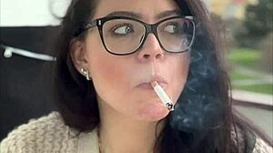 milf in glasses smokes cigarettes outdoors