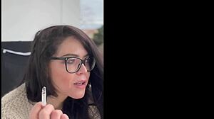 milf in glasses smokes cigarettes outdoors