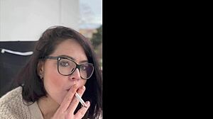 milf in glasses smokes cigarettes outdoors