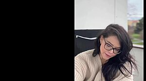 milf in glasses smokes cigarettes outdoors
