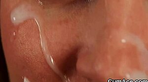 Flirty doll gets jizz load on face swallowing spunk