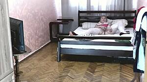 Blonde mature milf fingers wet pussy and squirts in bedroom