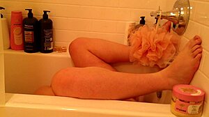 curvy pregnant woman relaxes in bathroom with natural curves
