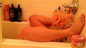curvy pregnant woman relaxes in bathroom with natural curves