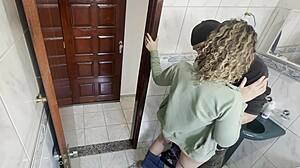neighbor enters the bathroom and gets close
