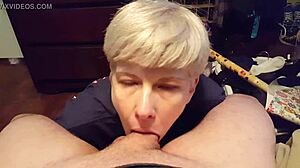 Blonde MILF performing natural blowjob on amateur cock