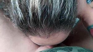 she's on her knees suckin my cock with big tits