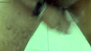 i was jerking off with my dildo in the shower, feeling every thrust and moan