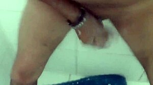 i was jerking off with my dildo in the shower, feeling every thrust and moan