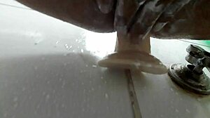 i was jerking off with my dildo in the shower, feeling every thrust and moan
