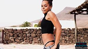 Agatha, the tiny tits ebony teen model, poses outdoors for Playboy