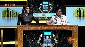 Lakshmi manchu showing huge features in outfit