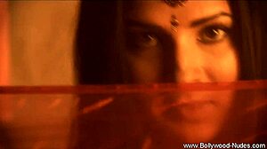 Indian brunette milf undresses with clothes ripped in striptease.