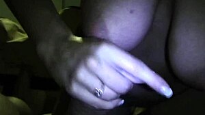 Busty stripper rips clothes and talks dirty during tease.