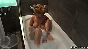 sabrina moon pleasures her wet pussy in the hot shower on webcam