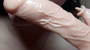 Man, this Asian milf goes wild with huge toys