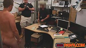 Pawn shop guy gets gay blowjob from customer.